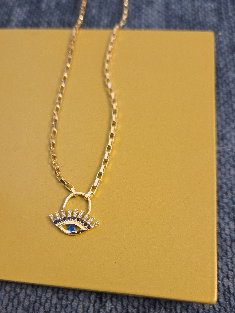 Gold Evil Eye Pendant Necklace with Blue Accent